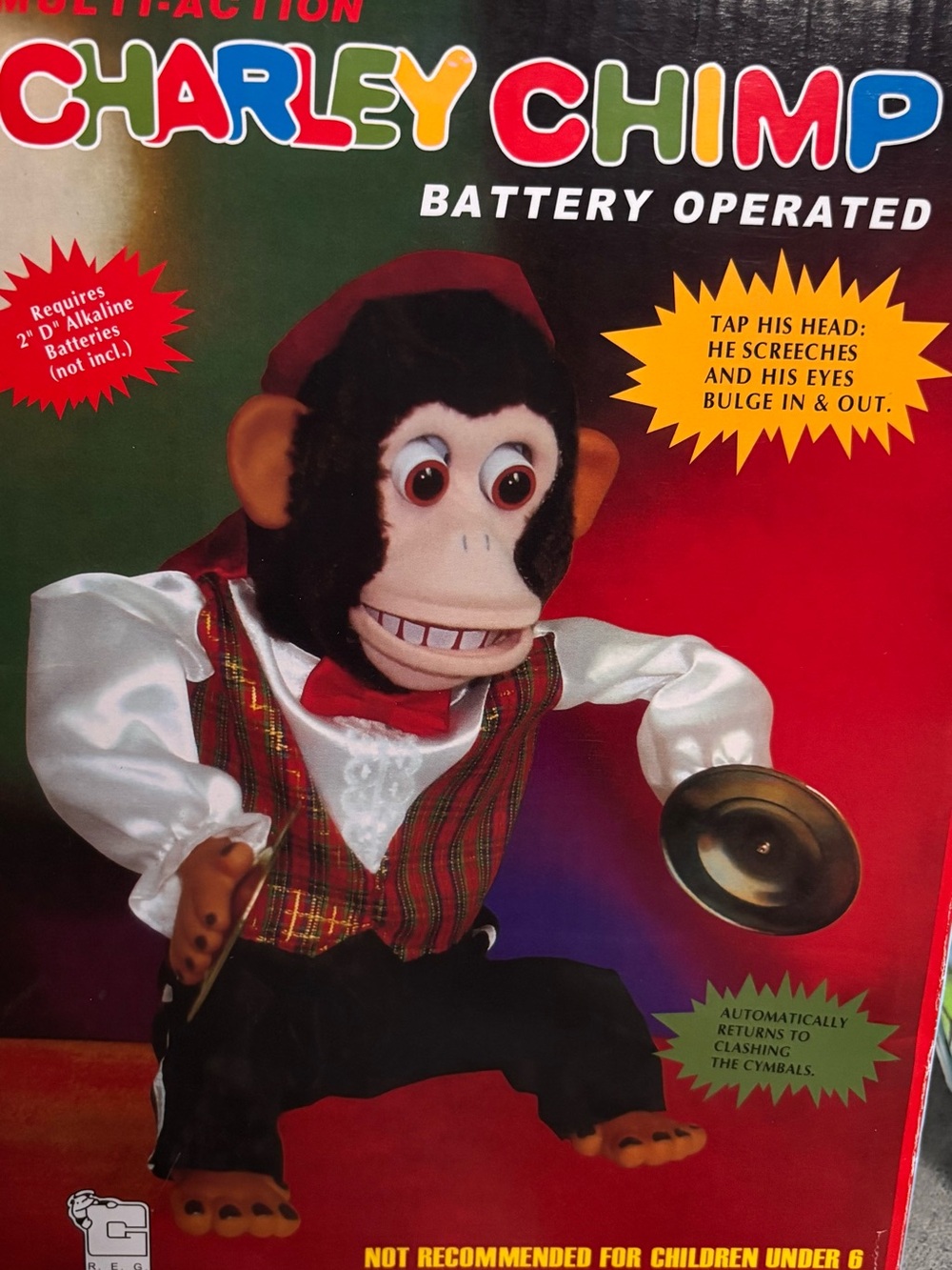Charley Chimp Battery Operated Musical Monkey Toy - Red White Black